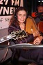 June Carter Cash with guitar