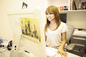 Kat DeLuna smiles while she gets ready for the web