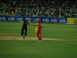 Umpire giving the bat to Parthiv Patel
